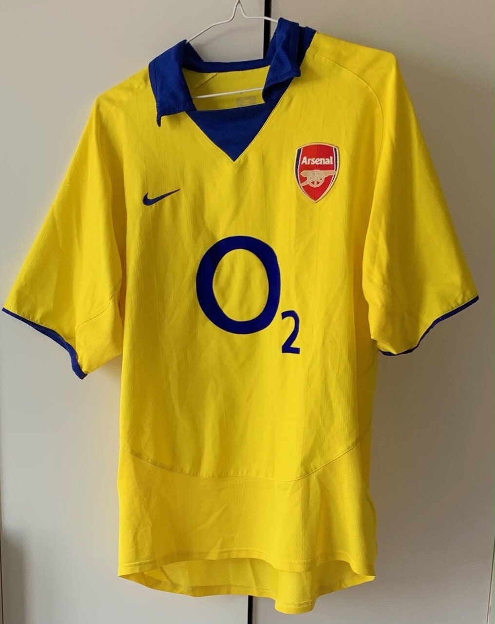 yellow jvc arsenal shirt