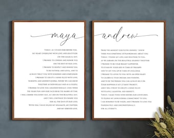 May include: Two framed prints with black text on white backgrounds. The text is a love letter to "maya" and "andrew" with vows and promises to each other.