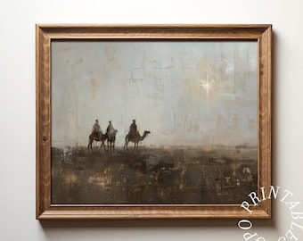 Puede incluir: Una pintura enmarcada que representa a tres figuras montando camellos a través de un paisaje desértico. El cielo es de un azul apagado con una estrella brillante en la distancia. La pintura tiene un estilo rústico y texturizado.