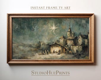May include: A framed painting shows a night scene with a star shining over a village. The artwork has a warm colour palette and a wooden frame. The text "INSTANT FRAME TV ART" and "StudioHuePrints" are visible.