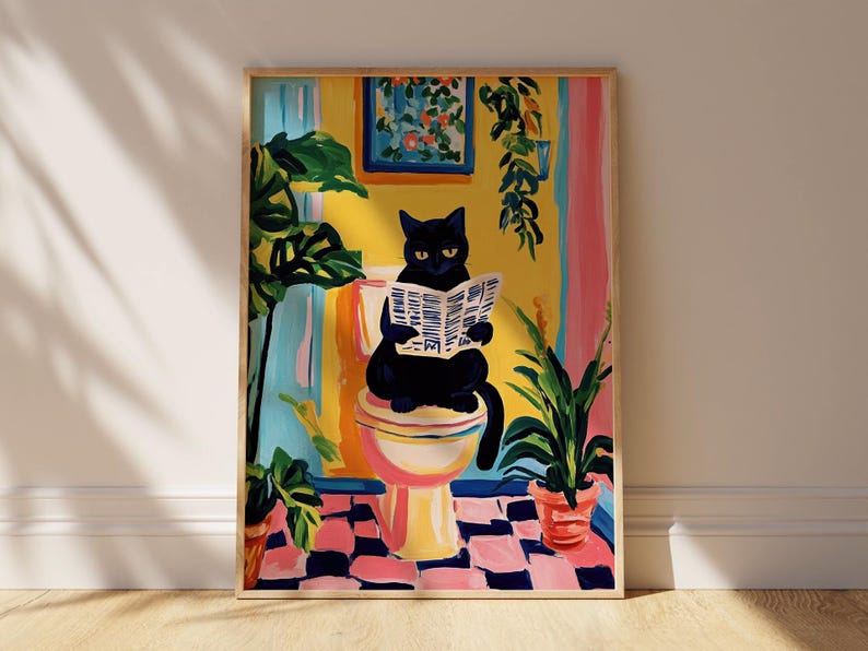 May include: A black cat sits on a pink and yellow toilet, reading a newspaper. The cat is in a bathroom with a yellow wall, a pink door, and green plants.