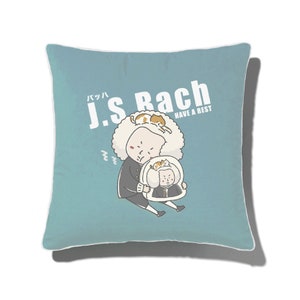 May include: A blue throw pillow with a white border features a cartoon illustration of a man with a white wig holding a smaller version of himself. The text "J.S. Bach" is written in white above the illustration, and the text "Have a Best" is written in white below the illustration. The text "バッハ" is written in black above the text "J.S. Bach".