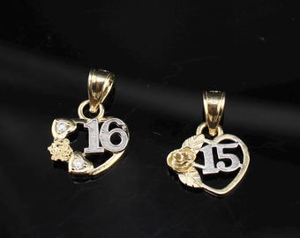 May include: Two gold-tone heart pendants. One pendant features the number "16" in silver, with a rose and two small gems. The other pendant has the number "15" in silver, with a rose and leaves.
