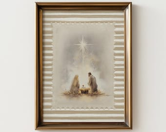 May include: Framed artwork depicting a nativity scene. The image features a star shining down on Mary, Joseph, and the baby Jesus. The artwork is framed in a gold-colored frame with a striped border.