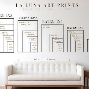 May include: A wall art size guide for prints with different ratios, including 2x3, 4x5, 3x4, and 11x4. The guide shows the dimensions in inches and centimeters for each ratio. The text "LA LUNA ART PRINTS" is at the top of the image. The guide also includes a sofa that is 99 inches (251.5 cm) wide.