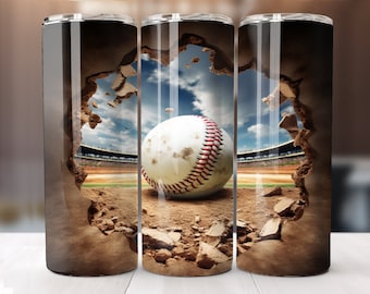 May include: A baseball-themed tumbler featuring a baseball breaking through a wall, revealing a baseball field and blue sky. The white baseball has red stitching. The design is printed on a stainless steel tumbler.
