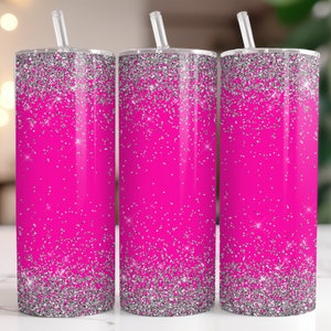 May include: Three stainless steel tumblers with pink and silver glitter designs. The tumblers have lids and straws.