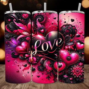 May include: A pink and black stainless steel tumbler with a floral design and the word "LOVE" in a large, bold font. The tumbler is decorated with hearts, swirls, and other romantic elements.