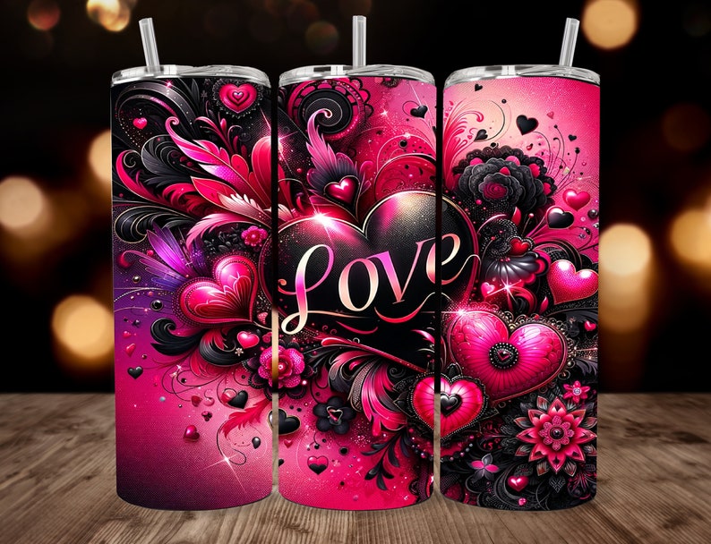 May include: A pink and black stainless steel tumbler with a floral design and the word "LOVE" in a large, bold font. The tumbler is decorated with hearts, swirls, and other romantic elements.