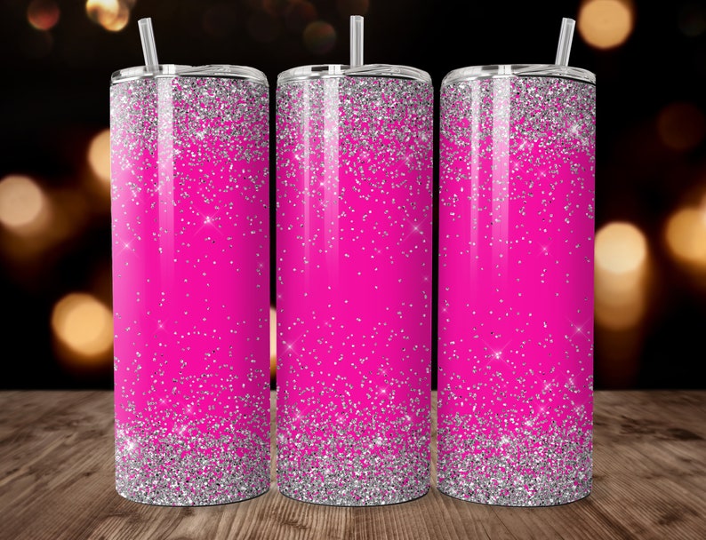 May include: Three stainless steel tumblers with a pink and silver glitter design. The tumblers have a silver glitter base and a pink glitter top.