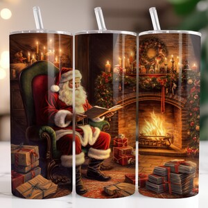 May include: A set of three stainless steel tumblers featuring a festive Christmas scene. Each tumbler depicts Santa Claus reading a book in a cozy room with a fireplace, gifts, and candles. The design is detailed and colorful, perfect for holiday beverages.