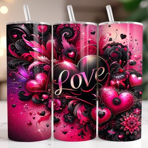 May include: Three pink and black stainless steel tumblers with a heart design and the word "LOVE" in a black font. The tumblers have a pink and black floral design with hearts and swirls.
