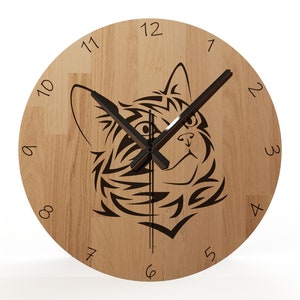 May include: A wooden clock with a black cat design and black hands. The clock face has Roman numerals.