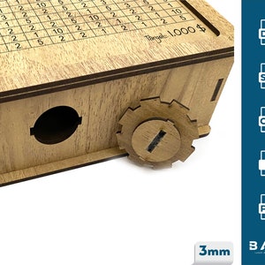 May include: A wooden box with a gear mechanism and a target of 1,000 dollars. The box is made of light brown wood and has a small hole in the side. The gear is made of dark brown wood and has a small hole in the center. The box is labeled "Target: 1,000$".
