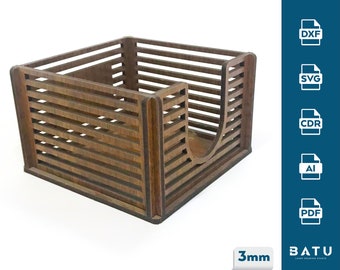 May include: A wooden note holder with a slatted design. The holder is 3mm thick and has a cutout for holding notes. The holder is brown in color.