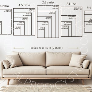 May include: A beige sofa measuring 85 inches wide positioned below a wall display of five black rectangular frames. Each frame contains multiple nested rectangles labeled with aspect ratios and dimensions in inches and centimeters.