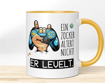 Lustige Tasse für Gamer | Motivtasse bedruckt "Ein Zocker altert nicht! Er levelt." » Bedruckte Kaffeetasse als Geschenk & für Dich selbst!