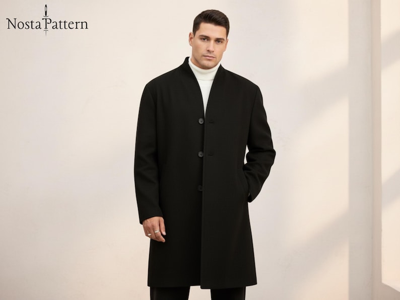 May include: A black overcoat with a mandarin collar and three buttons. The coat is worn over a white turtleneck. The brand name "Nosta Pattern" is visible in the upper left corner.