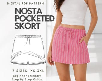 May include: A digital PDF pattern for a Nosta Pocketed Skort, featuring a pink and white striped skort with an elastic drawstring waistband and side pockets. The image includes a technical line drawing of the garment and text indicating 7 sizes from XS to 3XL.