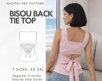May include: A digital PDF pattern for a "Bisou Back Tie Top" is displayed, alongside a woman wearing the top. The top is light pink with a white polka dot pattern, a square neckline, and a tie back. The pattern includes sizes XS-3XL.