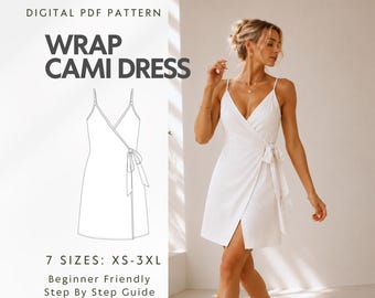 May include: A digital PDF pattern for a wrap cami dress, featuring a line drawing of a sleeveless dress with thin straps and a side tie closure. The text reads: DIGITAL PDF PATTERN, WRAP CAMI DRESS, 7 SIZES: XS-3XL, Beginner Friendly Step By Step Guide.