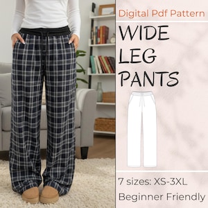Pode incluir: Calças de perna larga com padrão xadrez azul marinho e branco. As calças têm cós preto com cordão e bolsos. A imagem também inclui um padrão PDF digital com o texto "WIDE LEG PANTS", 7 tamanhos: XS-3XL e "Beginner Friendly".