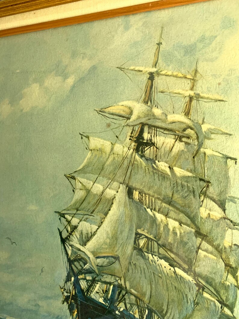 May include: A vintage painting of a tall ship with white sails against a blue sky with white clouds. The ship is sailing on a calm sea.