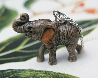 Porcelain Baby Elephant Pendant Necklace: Sterling Silver Plated Chain