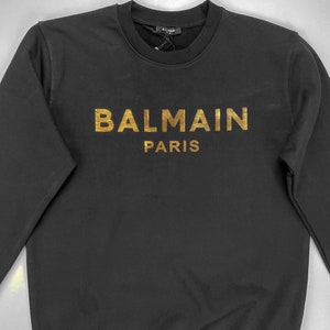 Vintage Balmain Schwarzes Sweatshirt Mit Goldener Briefmarke Gr. 2XL