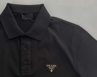 Schwarzes Prada-Poloshirt mit genähtem Aufnäher, Größe L