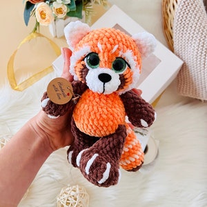 Crocheted red panda. Small panda. Himalayan panda. Crocheted fox. Gift for a child. Soft toy for sleep. Gift for a baby. Orange animal.