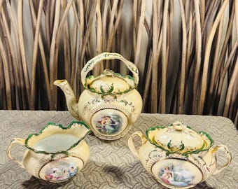 Antique Royal Saxe Porcelain Tea Set: Teapot, Creamer, Sugar Bowl