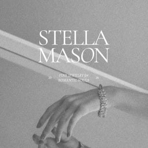 May include: Monochrome image featuring the text "STELLA MASON" and the tagline "FINE JEWELRY for ROMANTIC SOULS." A bracelet with a floral design adorns a hand. The image has a soft, elegant aesthetic, suggesting fine jewelry.