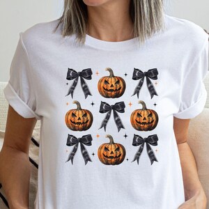 ハロウィン コケット ボウ パンプキン シャツ、パンプキン T シャツ、人気、女性ファッション、不気味な季節、ハロウィンの雰囲気、秋、ギフト、誕生日