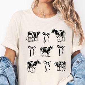 Coquette Cow Bow T-Shirt, Cow T Shirt, Farm Animal Shirt, Cottage Core T, Cow Lover shirt, Farmer Mom gift, Farm Wife shirts, Cattle t-shirt