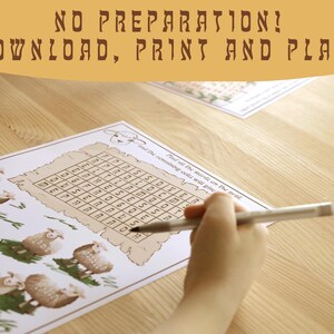 May include: A printed word search puzzle featuring sheep illustrations and the text "NO PREPARATION! DOWNLOAD, PRINT AND PLAY!". A hand holds a pen, completing the puzzle on a wooden surface. The puzzle is designed for children.
