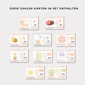 May include: A set of ten educational number cards featuring illustrations of a snail, bee, ice cream, ladybug, flower, dinosaur, donut, jellyfish, sun, and tree. Each card displays a large numeral, a number line, hand signs, and German text.
