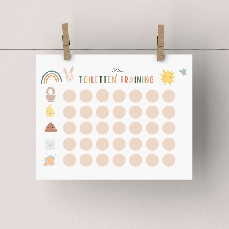 May include: A white printable chart with a rainbow, bunny, toilet, poop, toilet paper, and hand washing icons. The chart has 35 circles for tracking potty training progress. The text "Mein TOILETTEN TRAINING" is at the top of the chart.