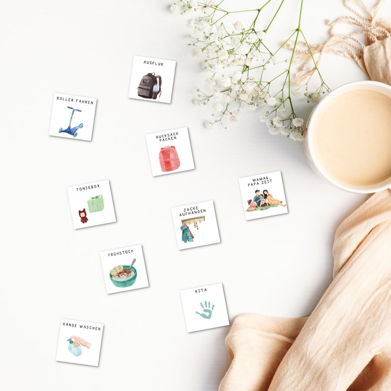 May include: A set of nine illustrated cards with German text, depicting activities for a child's daily routine. The cards feature images of a scooter, a backpack, a lunchbox, a jacket, a handprint, a bowl of cereal, a family, and a bottle of hand soap.