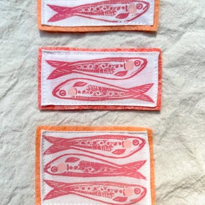 Pink sardine fish printed patch // handmade linocut block print sew on nautical patch for jacket/hat with wool blend felt backing