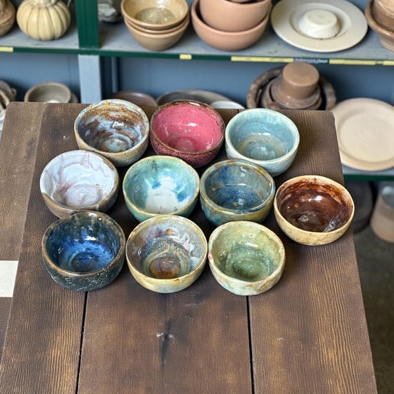 A set of graduating handmade stoneware nesting bowls — the 'nesting' format is genuinely clever and 85 favorites confirms real shoppers agree.