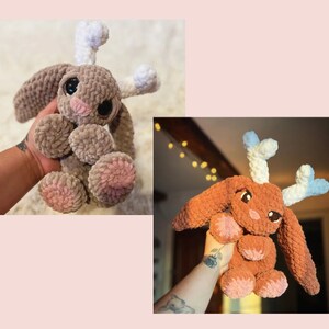 May include: Two plush bunny toys, one in brown and the other in orange, each with large eyes, pink accents, and white antlers. The toys are handmade and have a soft, textured appearance, perfect for children.
