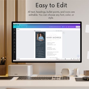 May include: A computer screen showing a resume template with a photograph of a man wearing a blue shirt. The template is titled "Henry Monroe" and includes sections for honours and awards, leadership, extracurricular activities, and community involvement.