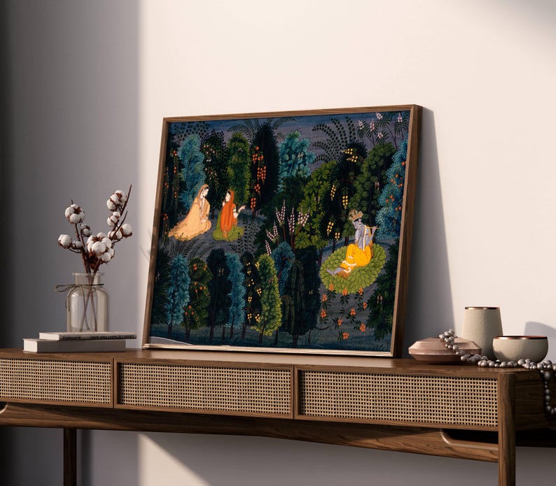 May include: A framed painting showing a detailed forest scene with figures in traditional dress. The artwork uses blues, greens, and oranges, with intricate details in the foliage and figures. The painting is displayed on a wooden console table.