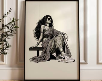 May include: Black and white art print of a person wearing a traditional sari, sunglasses, and sneakers. The person is seated on a bench. The artwork is framed in a black frame and set against a neutral background.