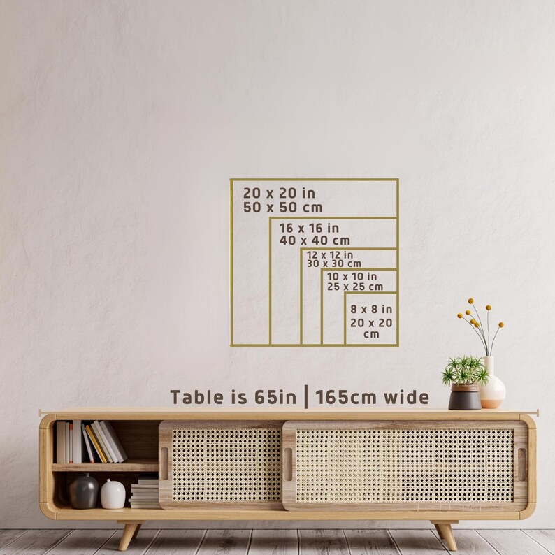 May include: A display of framed rectangular sizes in inches and centimetres, including 20x20 in (50x50 cm), 16x16 in (40x40 cm), 12x12 in (30x30 cm), 10x10 in (25x25 cm), and 8x8 in (20x20 cm). The table is 165cm wide.