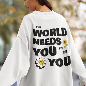 The World Needs You Sweatshirt | Trendy Sweatshirt | Flower Crewneck | Smiley Sweatshirt | Aesthetic Shirt | Mental Health Shirt