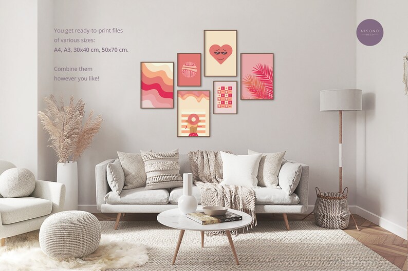 Pink preppy wall art of posters with orange pink illustrations hangs on the wall in a living room above the beige sofa