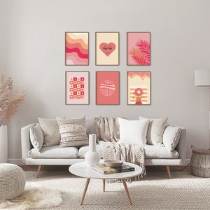 6 pink preppy posters with orange pink illustrations hangs on the wall in a living room in beige color