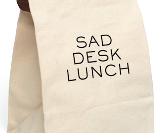 Sad Desk Lunch Bag With Strap, This ludicrously capacious canvas lunch bag makes a great coworker gift